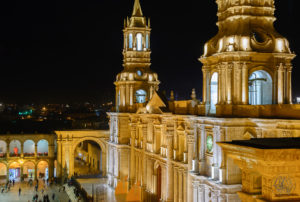 Cathedral on Plaa de Armas, Arequipa glowing gold at night. 