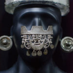 Silver Chimu ceremonial mask and earrings.